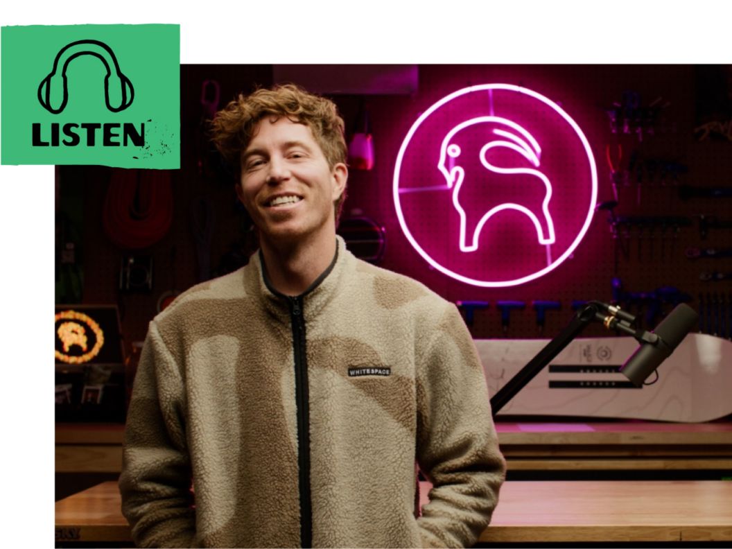 Shaun White smiles in the Backcountry Podcast studio. A headphone icon and the word “Listen.” 