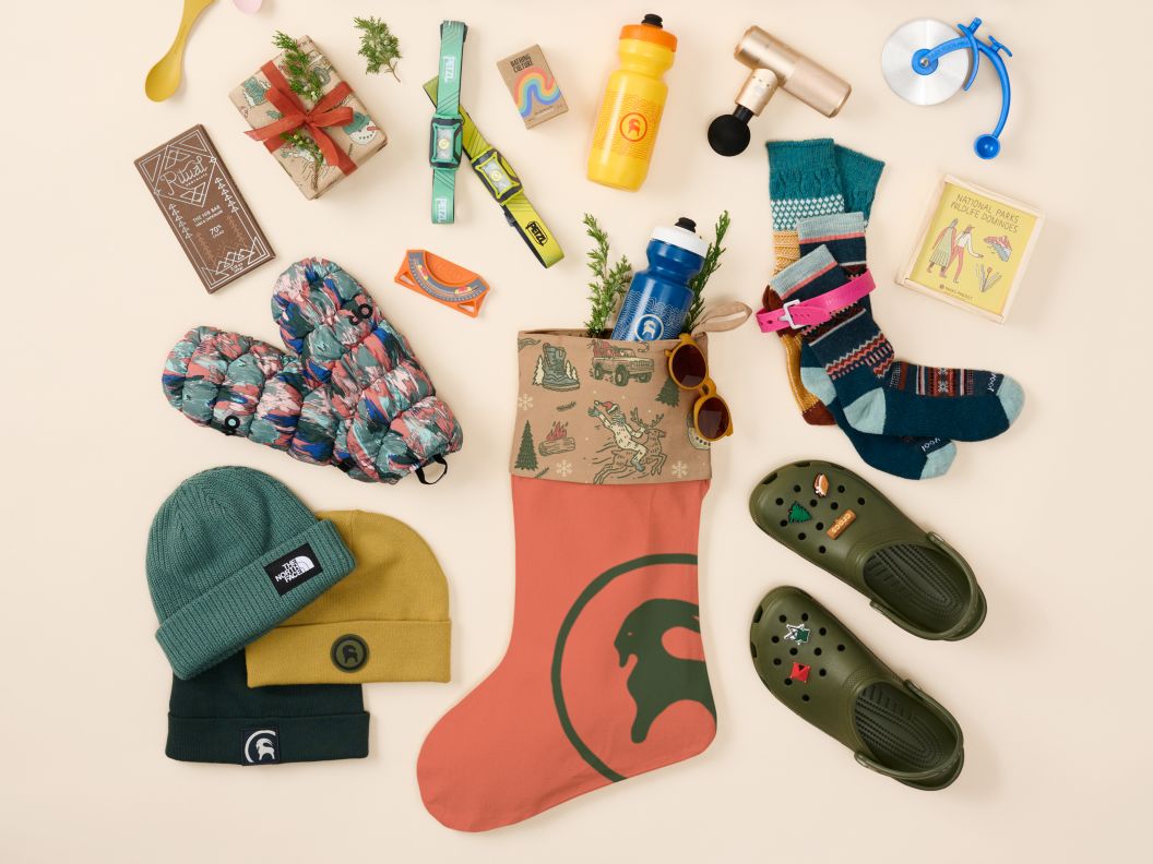 A stocking and assortment of outdoor gifts. 