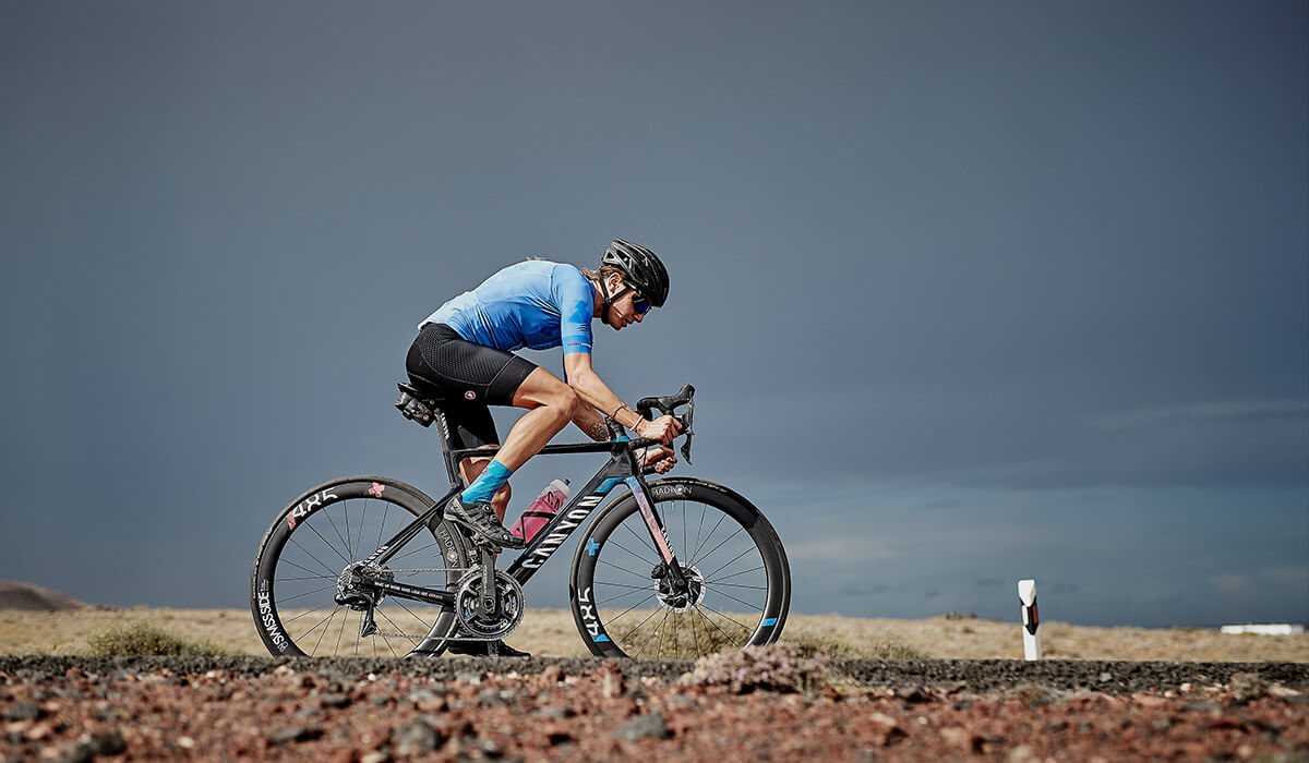 Girl with blue castelli jersey riding bike