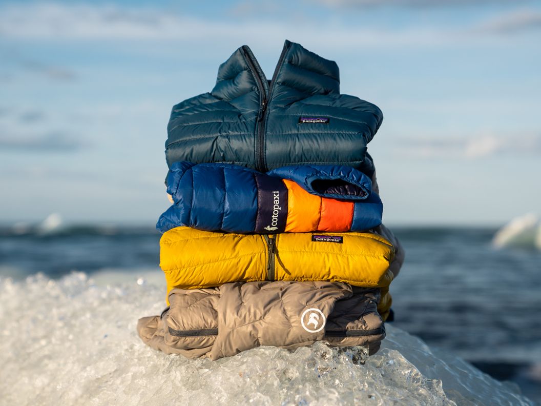 A stack of folded insulated jackets