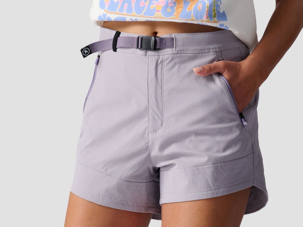 A model wearing purple sage ripstop shorts.