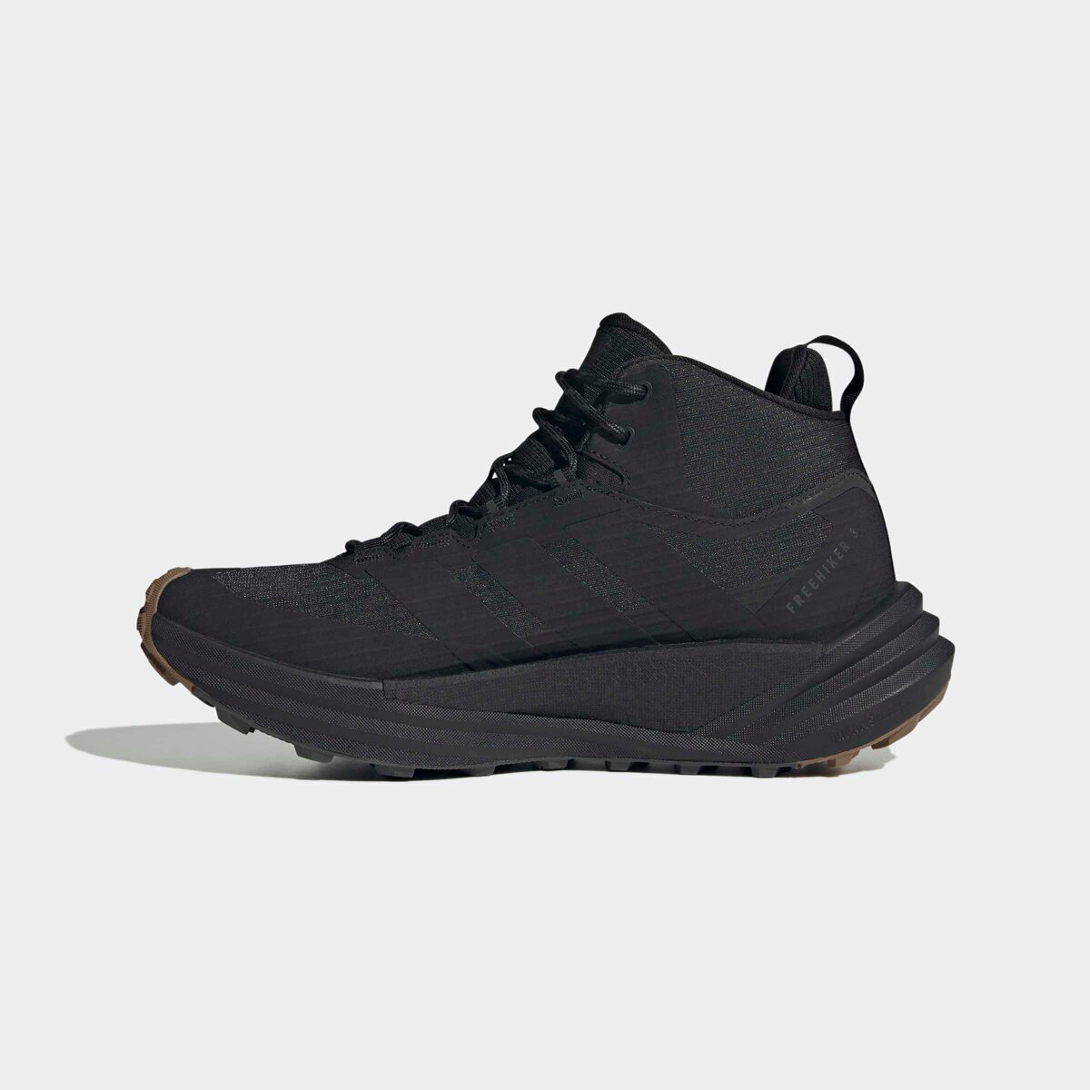 Мужские ботинки Adidas TERREX Terrex Freehiker 3 Mid GTX Hiking Boot, цвет: Чёрный / Коричневый — фото 4
