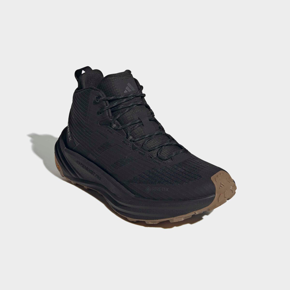 Мужские ботинки Adidas TERREX Terrex Freehiker 3 Mid GTX Hiking Boot, цвет: Чёрный / Коричневый — фото 5
