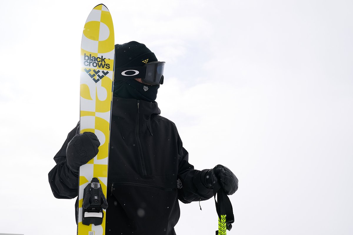 Skier holding Black Crow Vena Ski