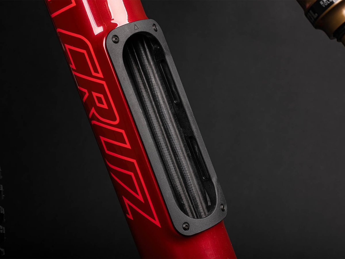 Detail of a Santa Cruz glovebox compartment on Blur down tube.