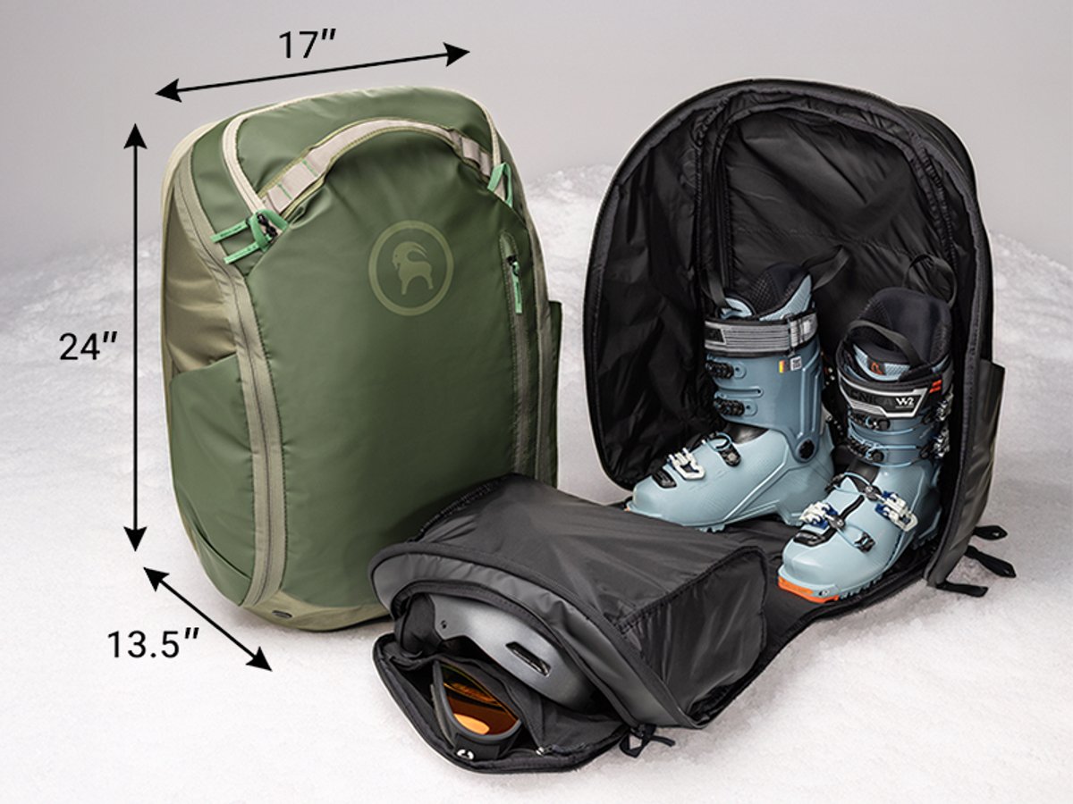 Two boot bags next to eachother, one has dimension graphics, the other is open and packed with ski boots, helmet, goggles.