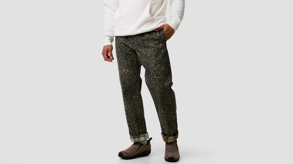 A man wears the BGA Venture Daily Flannel Lined Pants.