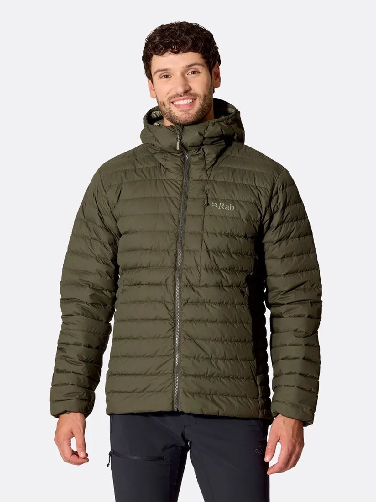 A man wears the Microlight Windstopper Jacket.
