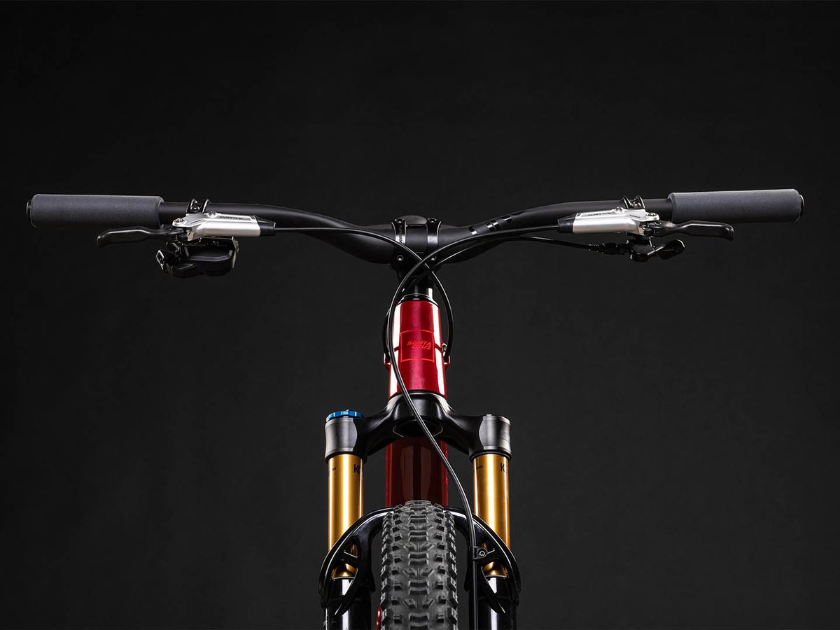 Blur standard mountain bike stem close up from the front showing riser handlebar