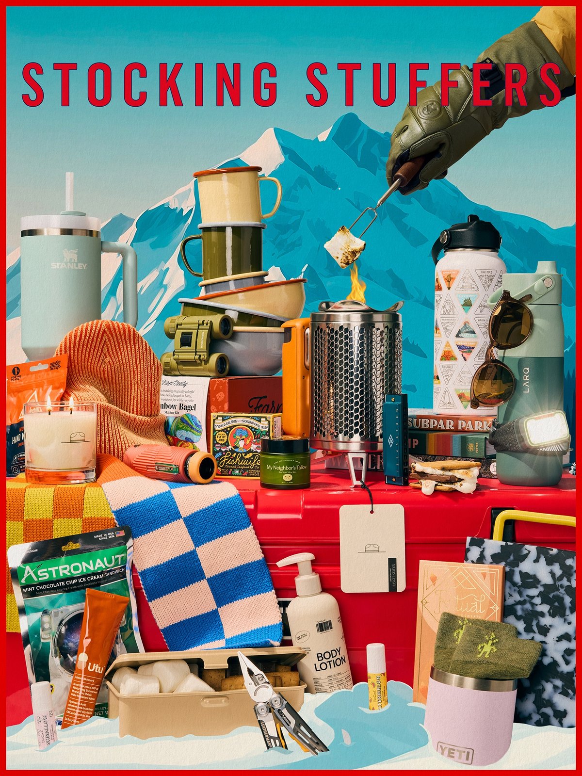 A red yeti cooler piled with small gifts, like a mini marshmallow fire pit, tin camp cups, various trendy water bottles, backpacking food, binoculars, scarves, multi-tools, socks, beanies, and scarves. The word Stocking Stuffers appears in the blue sky.