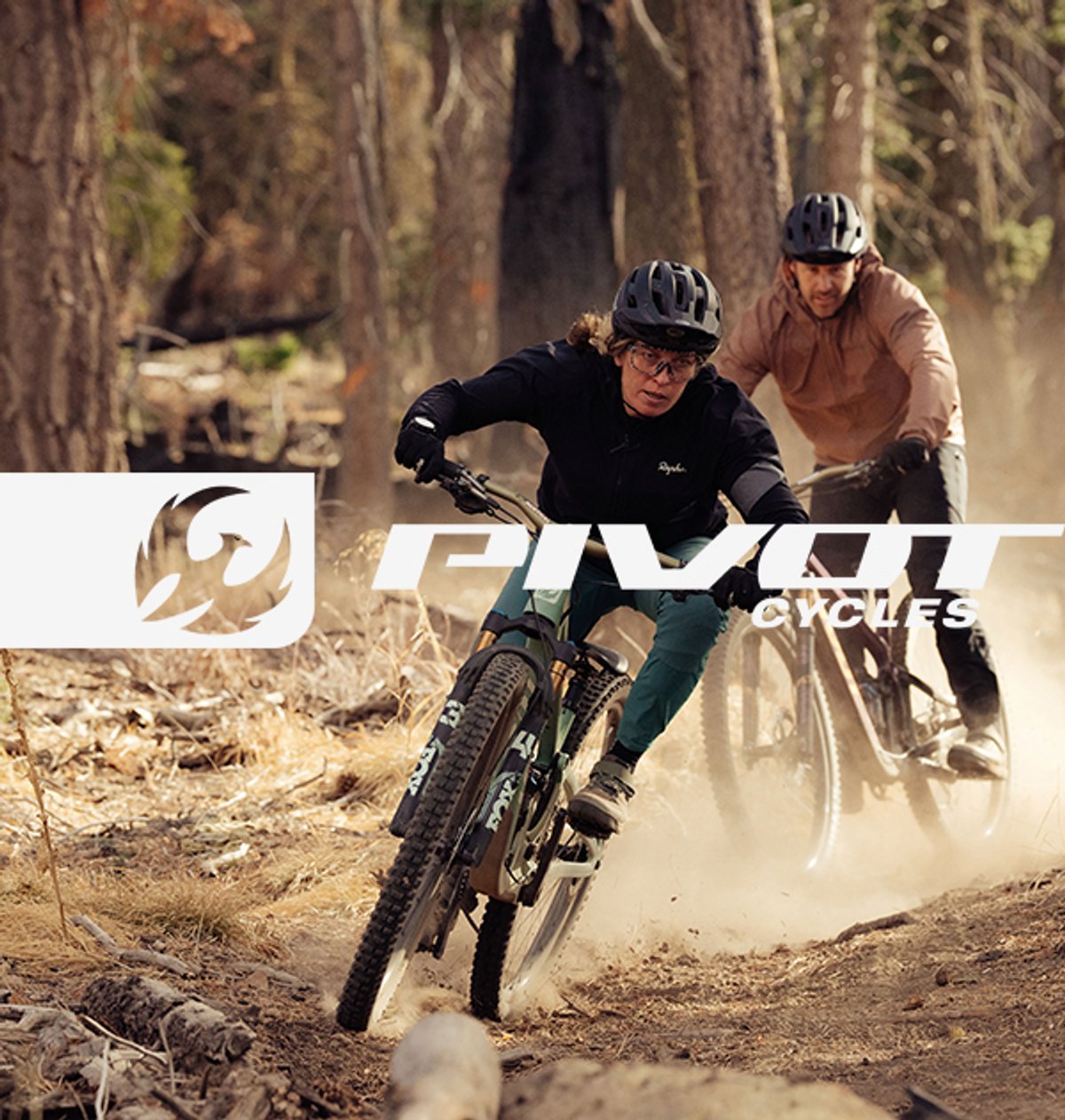 Two cyclist racing down a trail with Pivot brand logo overlay.