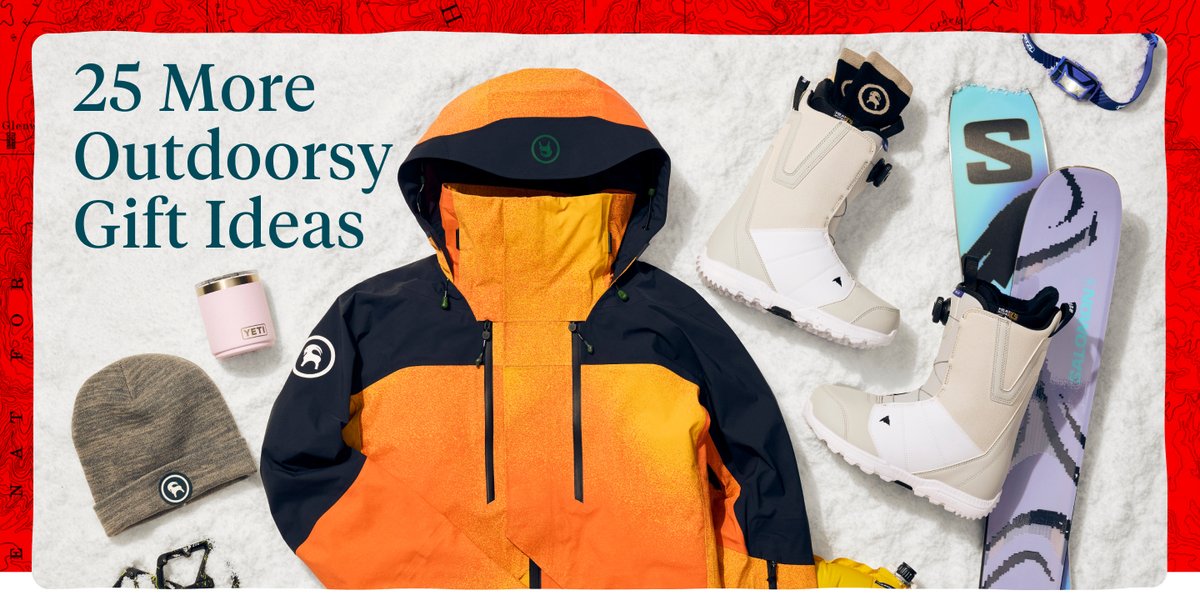 A flat lay display features an orange and ski jacket, a gray knit beanie, a pink Yeti tumbler, Burton  snowboard boots, Salomon skis, a headlamp, and the text: "25 more outdoorsy gift ideas."