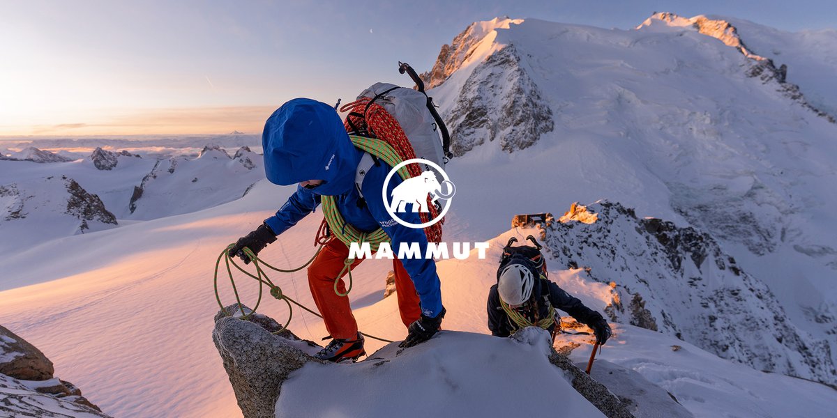 The Mammut logo layered over a photo of a person climbing a snowy mountain.