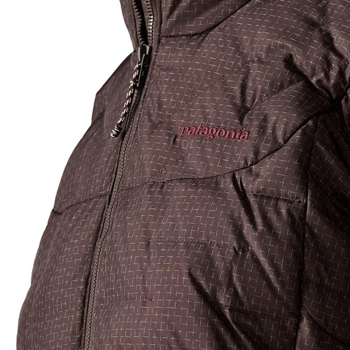 Close up detail shot of Patagonia chest logo and shell fabric of Durable Down Jacket.
