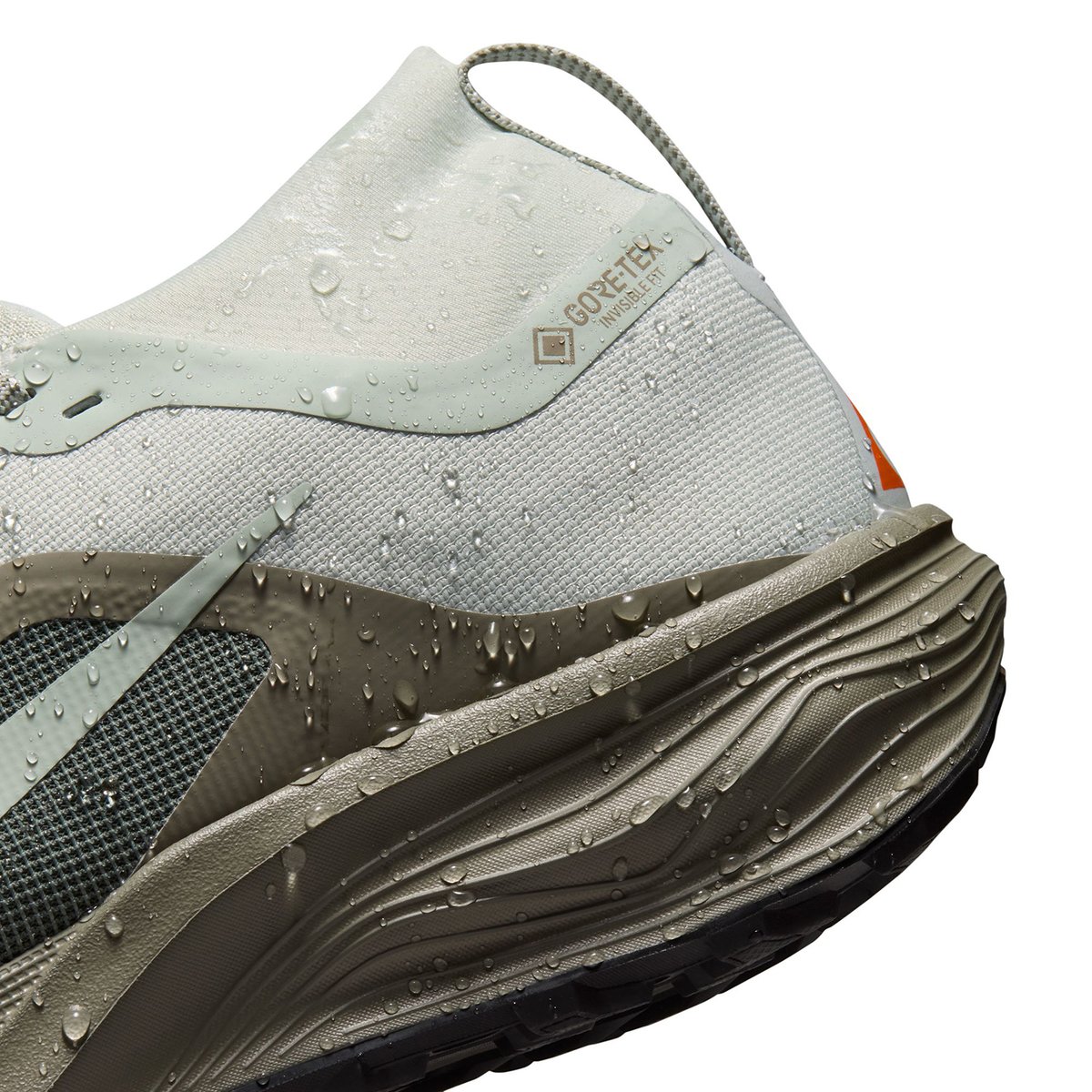 Water beading on the Nike ACG Pegasus Trail GTX upper next to the GORE-TEX Invisible Fit label.