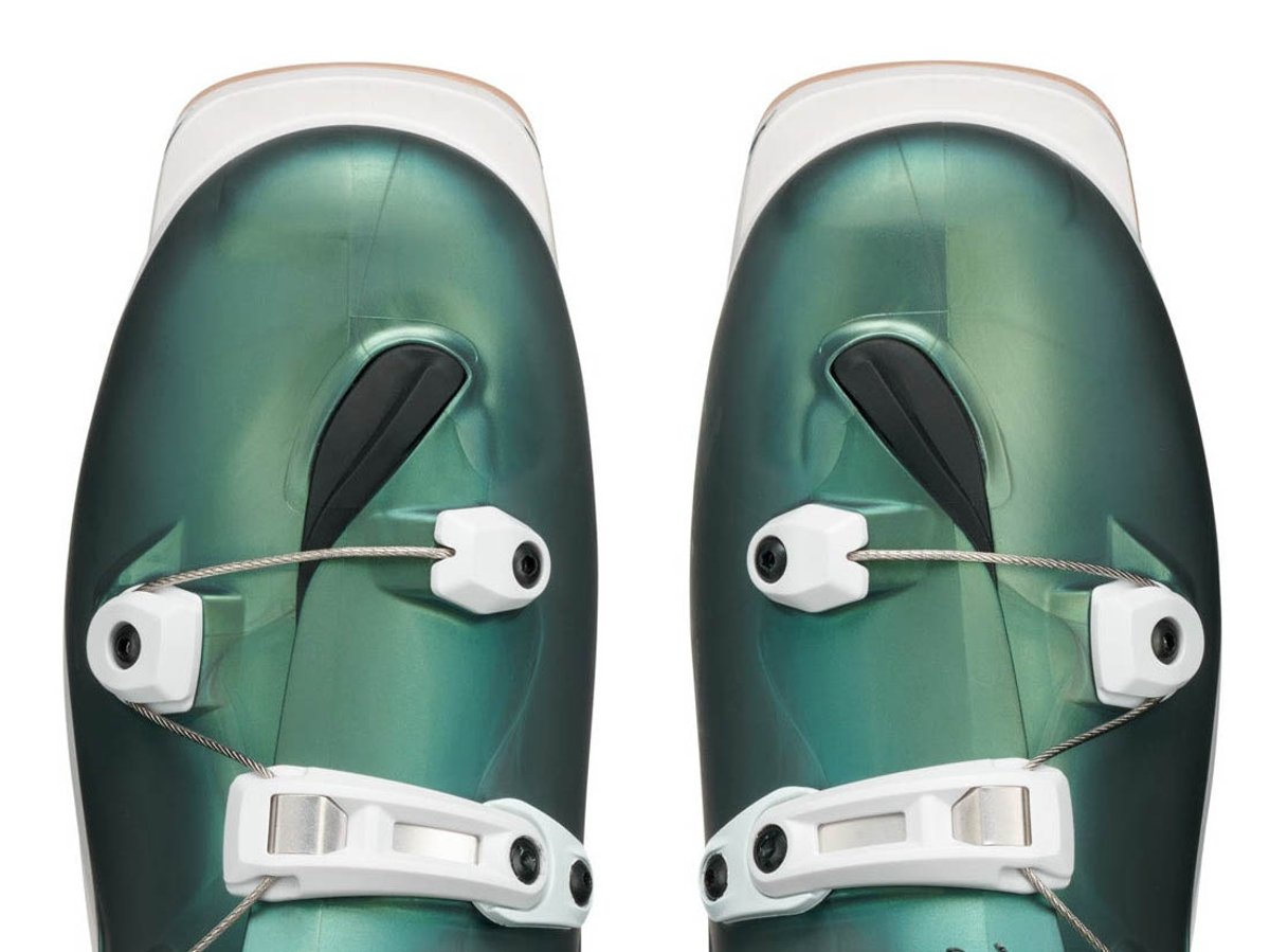 Top-down crop of women's SCARPA F1 RS toe boxes in teal green showing Overlap Flow shell construction and buckle cable system