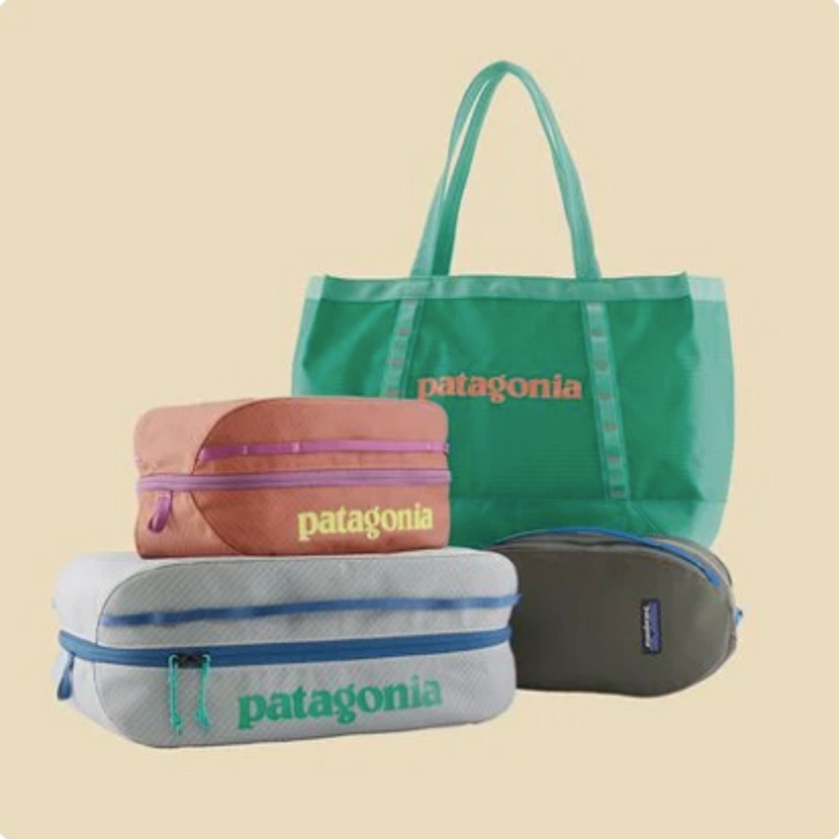 Patagonia Black Hole totes & cubes against a yellow background.