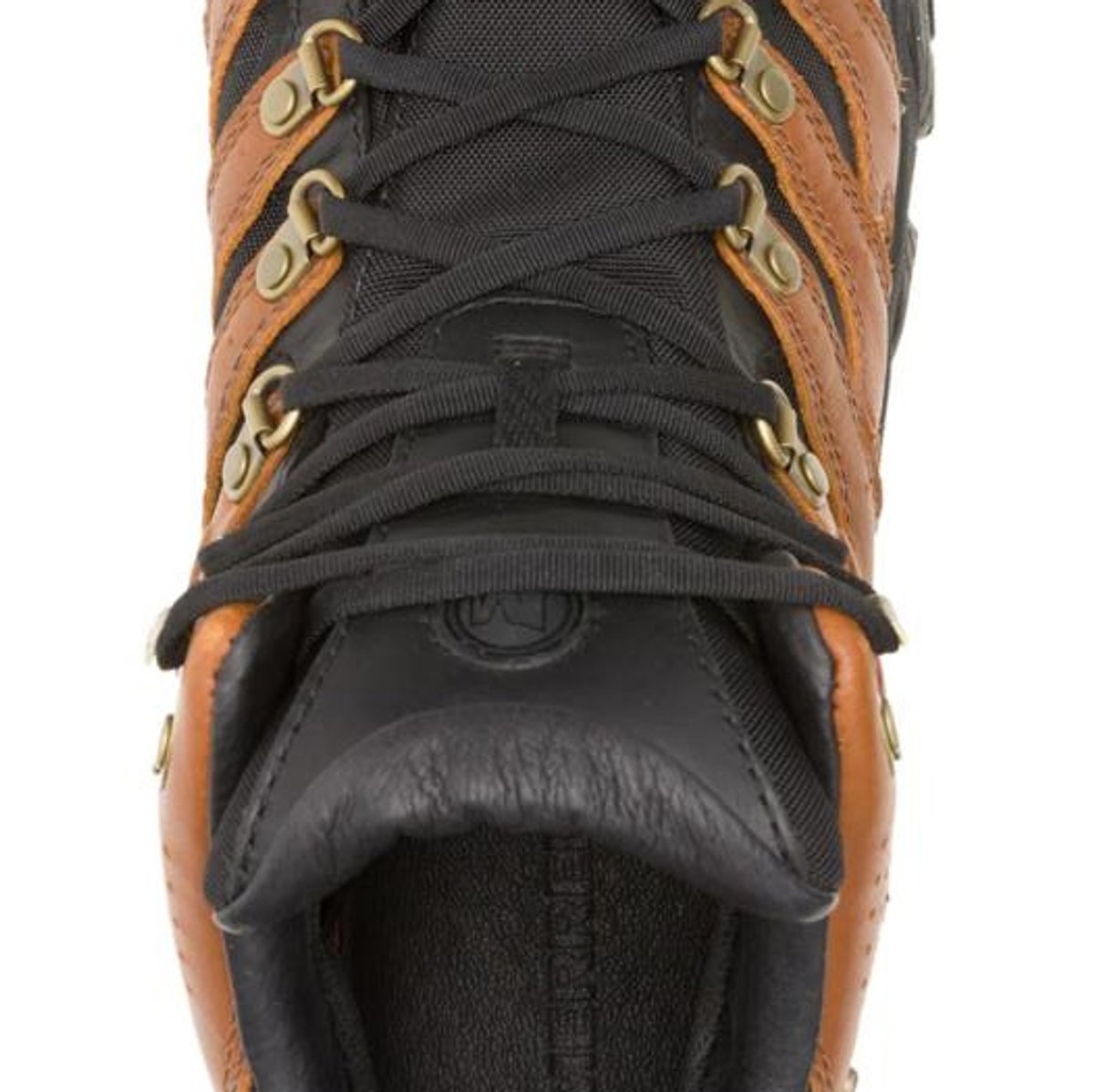 Close-up of the tongue a Merrell hiking shoe, showing laces and grommet hardware.