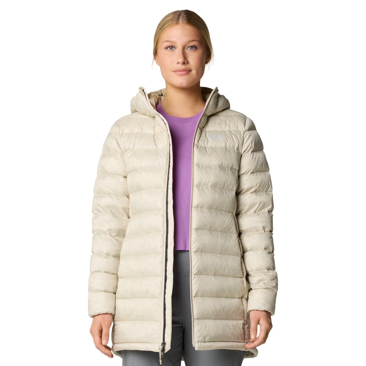 A woman wearing the Tiberondack Down Parka unzipped