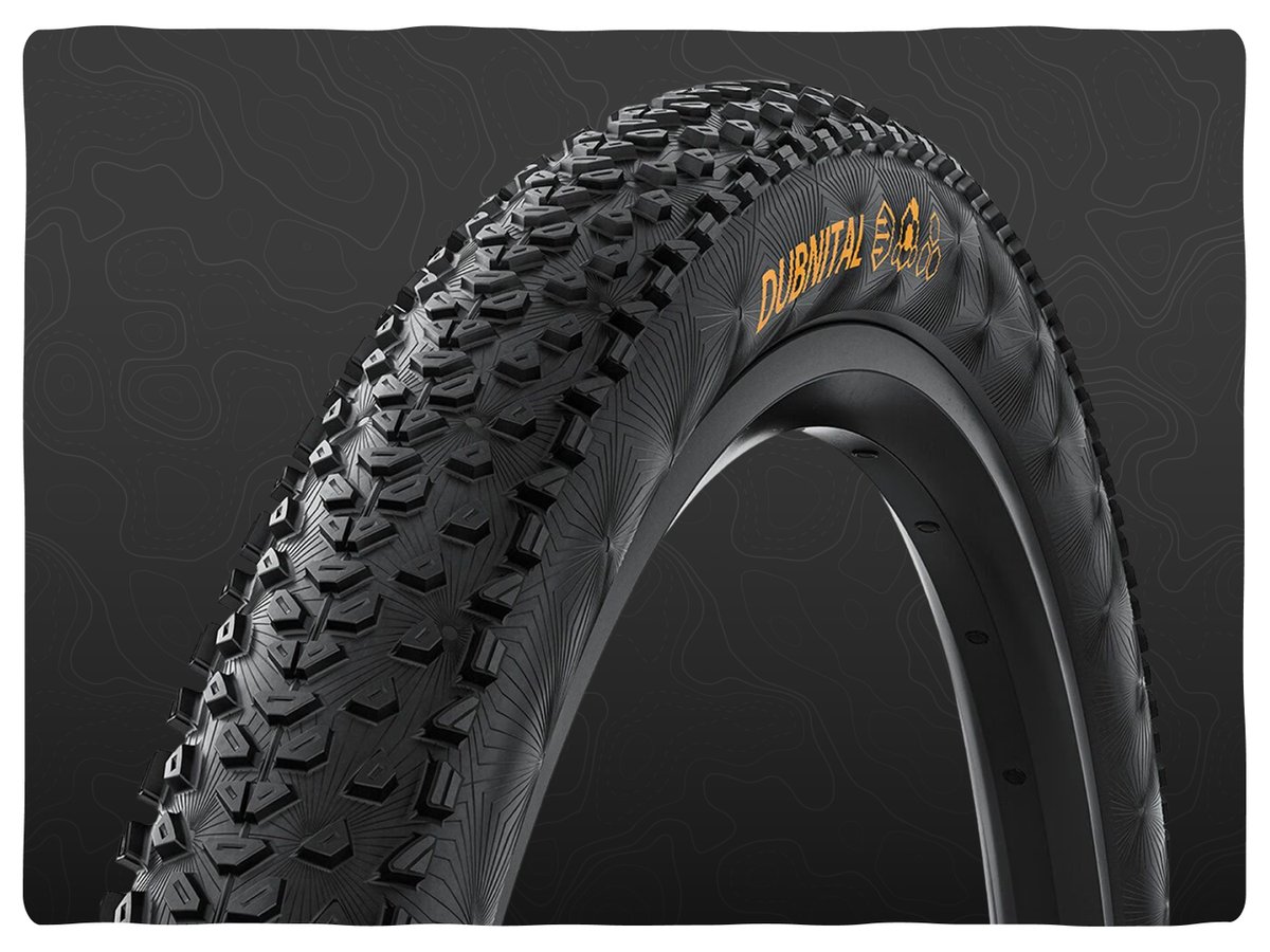 A 29in mountain bike tire with closely spaced siped lugs. 