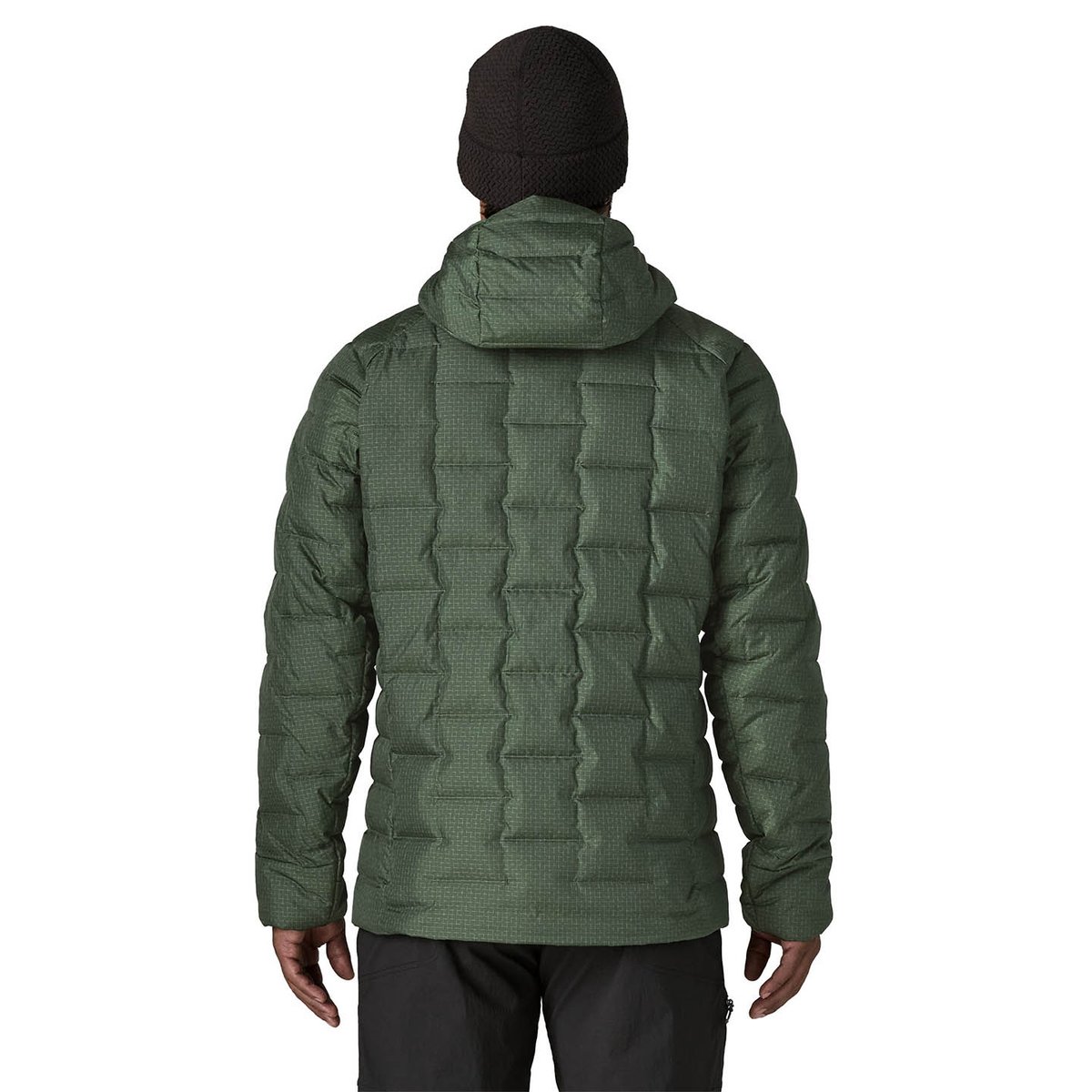 person pictured from behind standing wearing great durable down jacket showing discontinuous baffle quilting pattern.