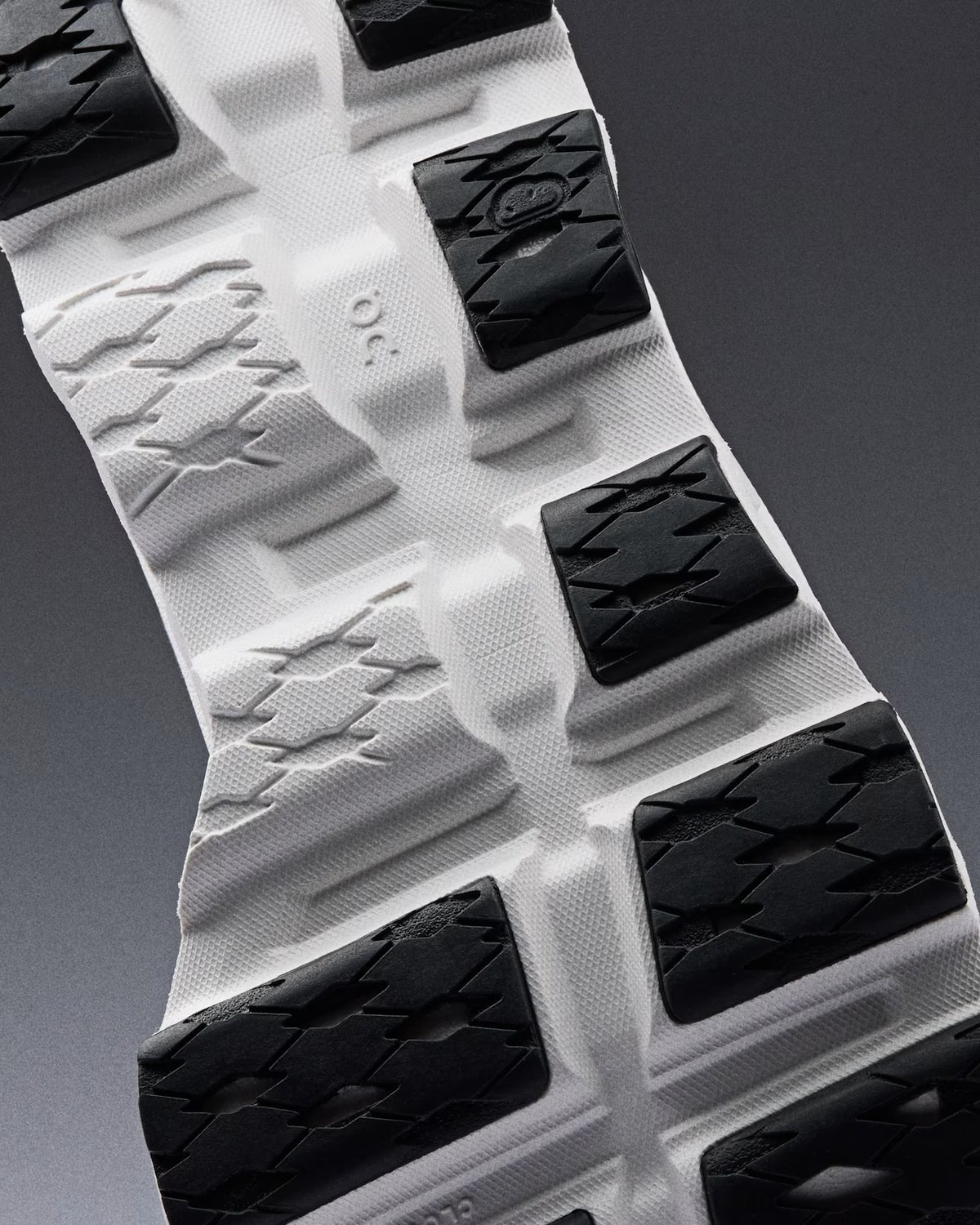 Close up of sole of Cloudmonster 3 shoes.