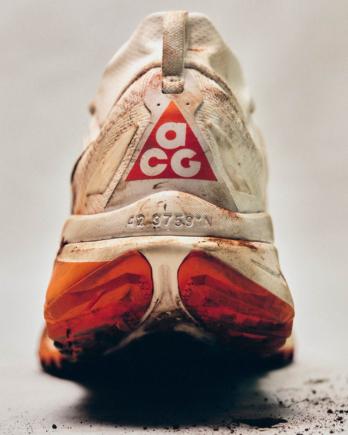 Nike ACG Zegama shoe from behind with some dirt on it.