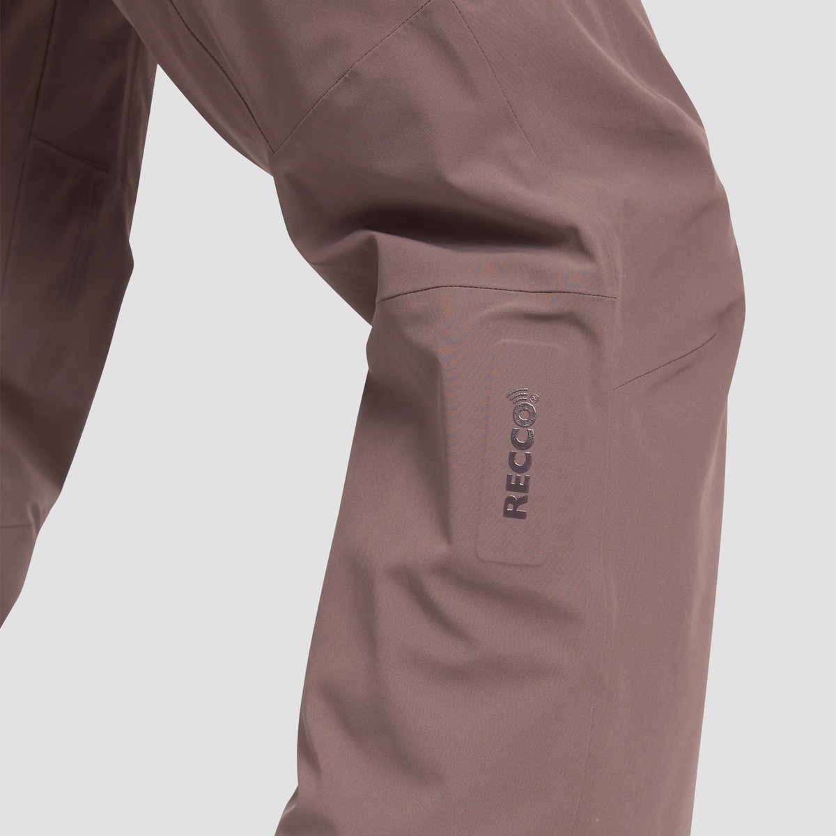 A closeup of the integrated RECCO technology on the leg of a Black Diamond Recon pant.