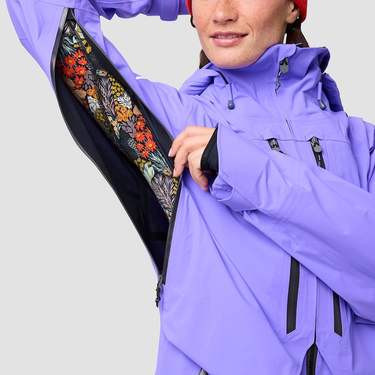 Person wearing Backcountry Cottonwoods LT jacket unzipping large unlined pit-zip vent.