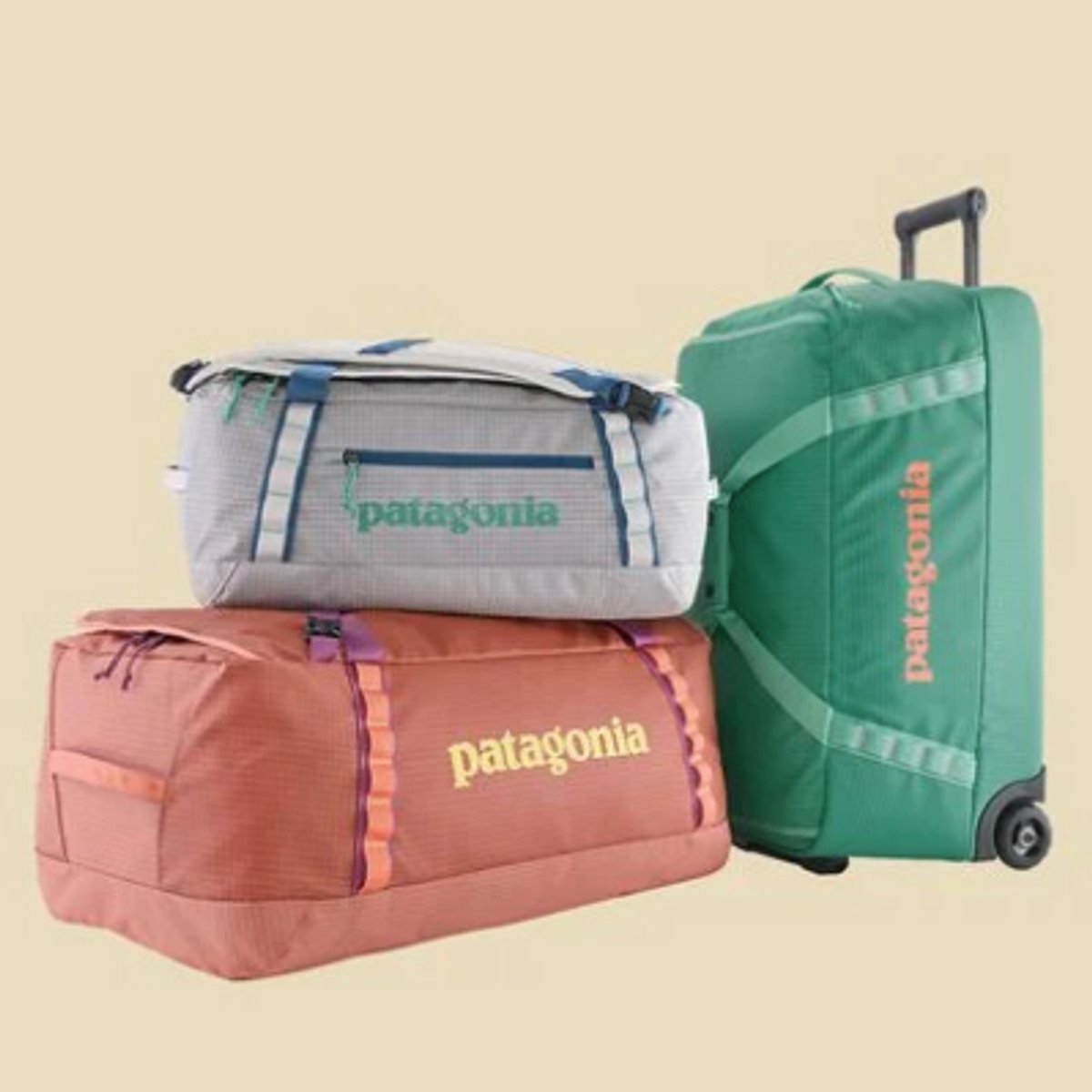 Three Black Hole Duffle bags set against a yellow background.