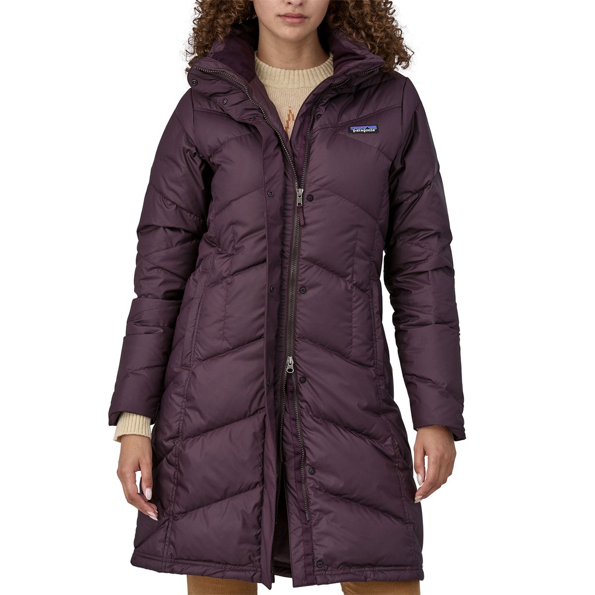 A torso shot of a woman wearing the Down With It Parka