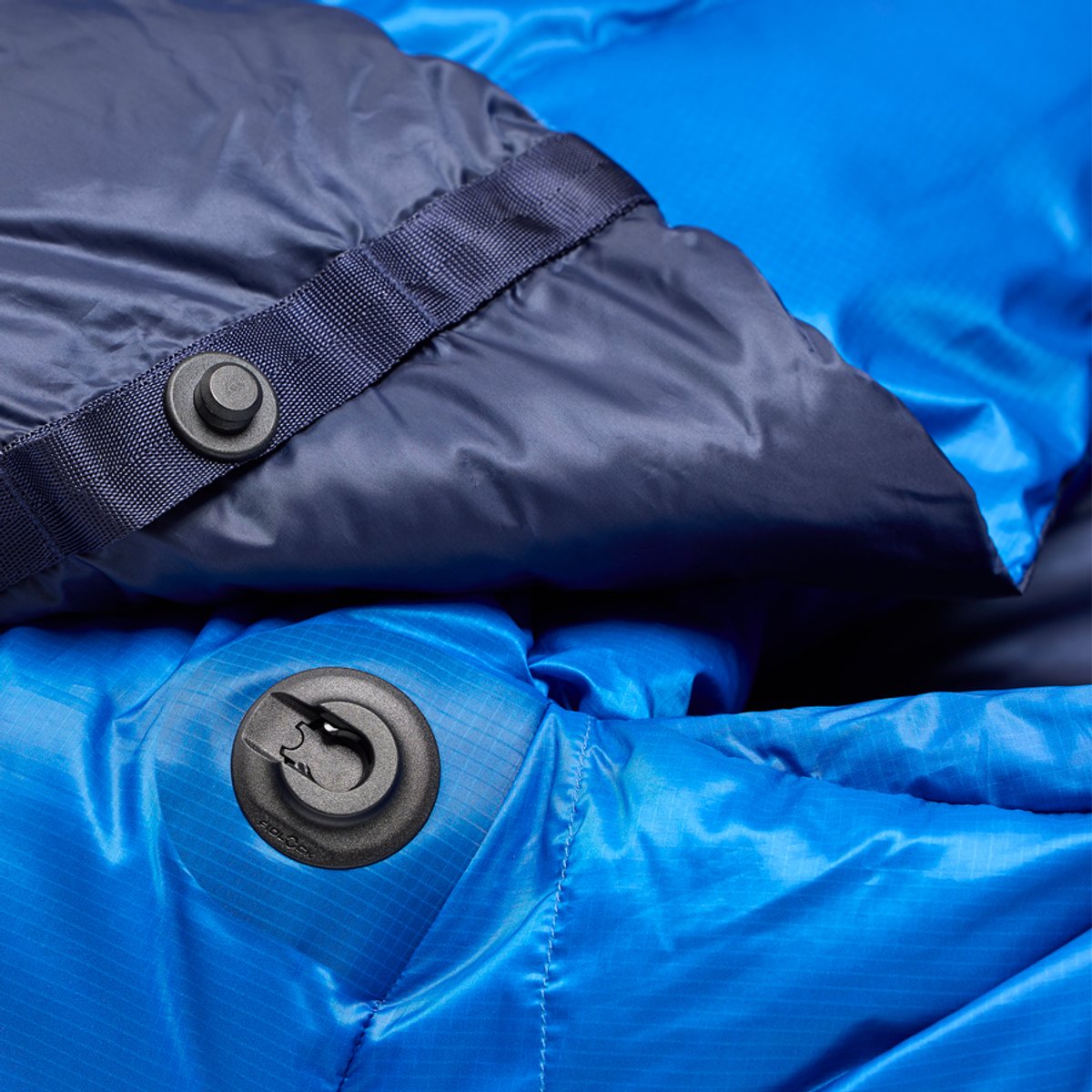 A closeup of the Marmot Wraptor snap closures