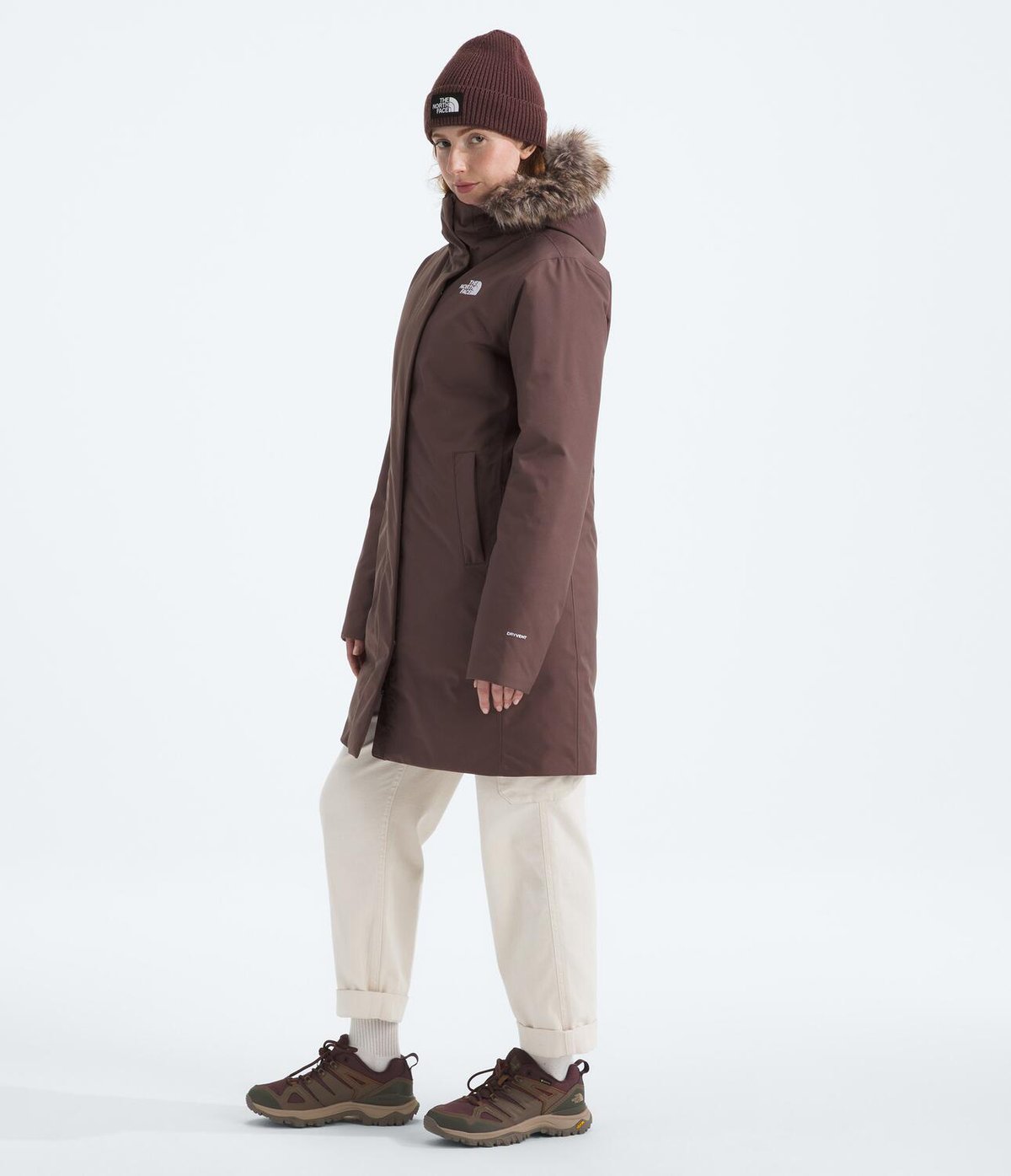 A full body shot of the Arctic Down Parka on a model