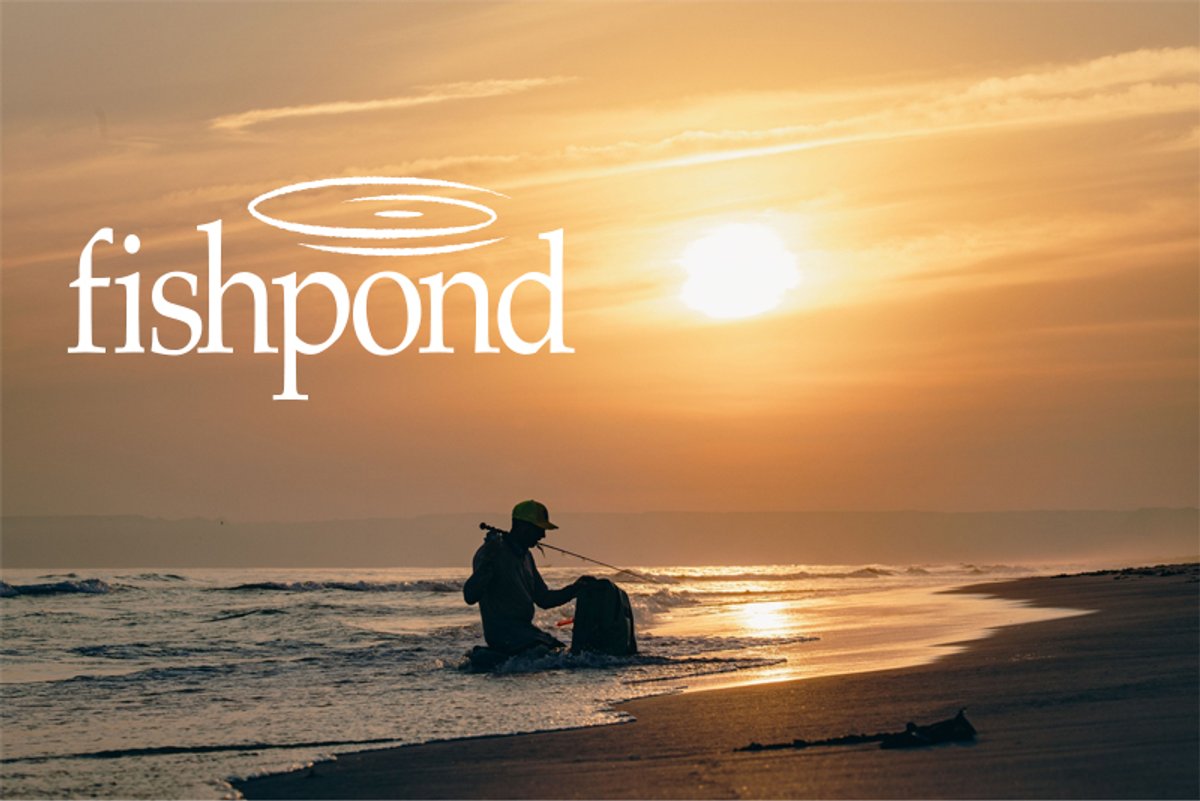 A silhouette of a fisherman on a beach at sunset, with the sun low on the horizon reflecting over the ocean waves. The white "fishpond" logo is overlaid in the upper left corner.
