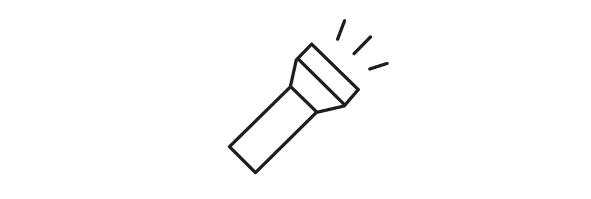 A flashlight shines brightly