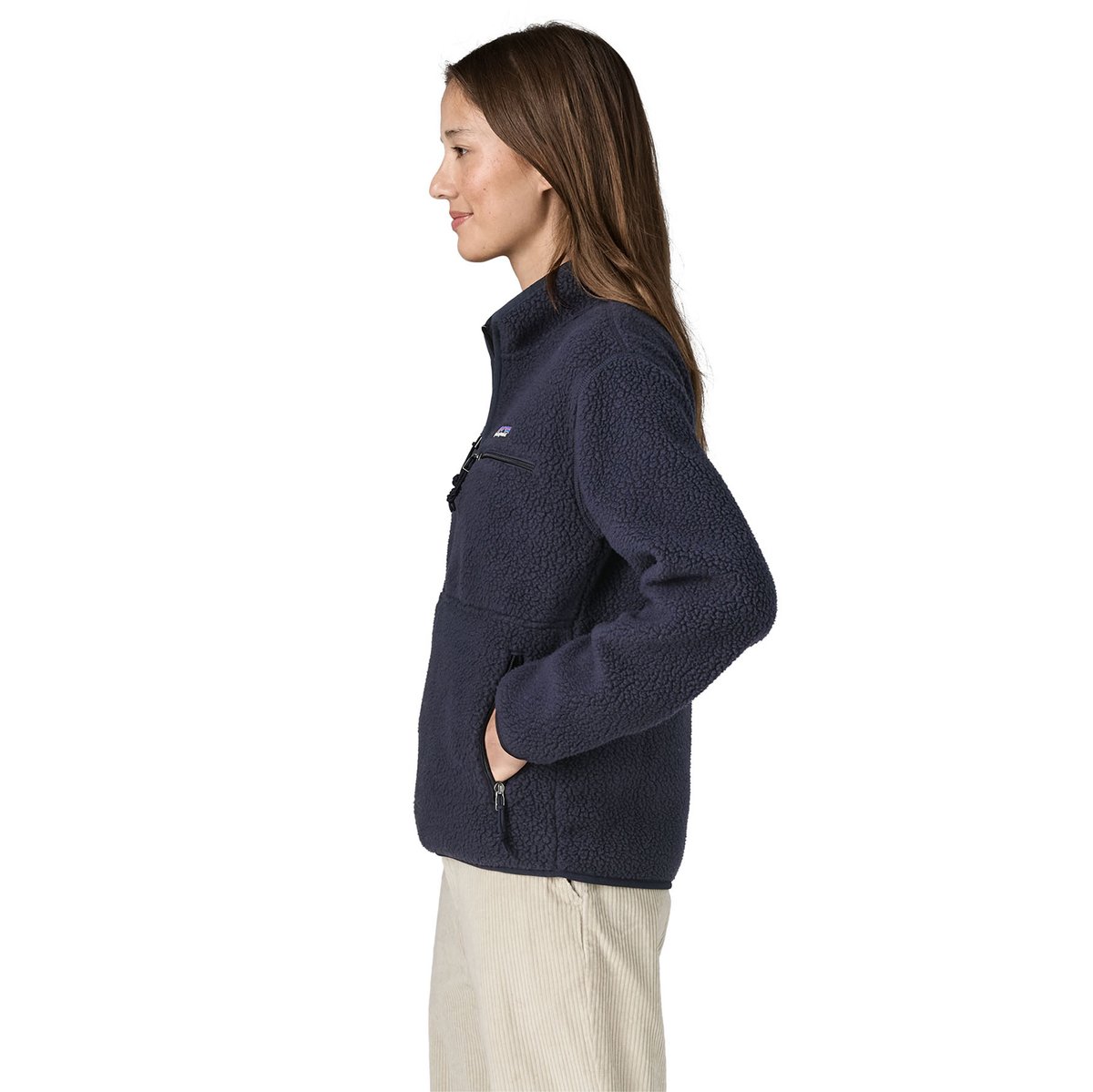A side view of a woman wearing the Retro Pile Marsupial Pullover