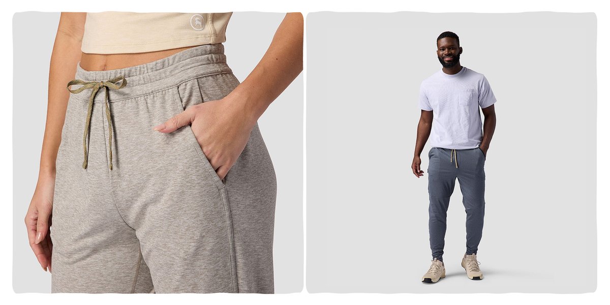 A close-up of a woman wearing light gray athleisure sweatpants; on the right, a man is standing and smiling, wearing slate blue joggers with a white t-shirt.