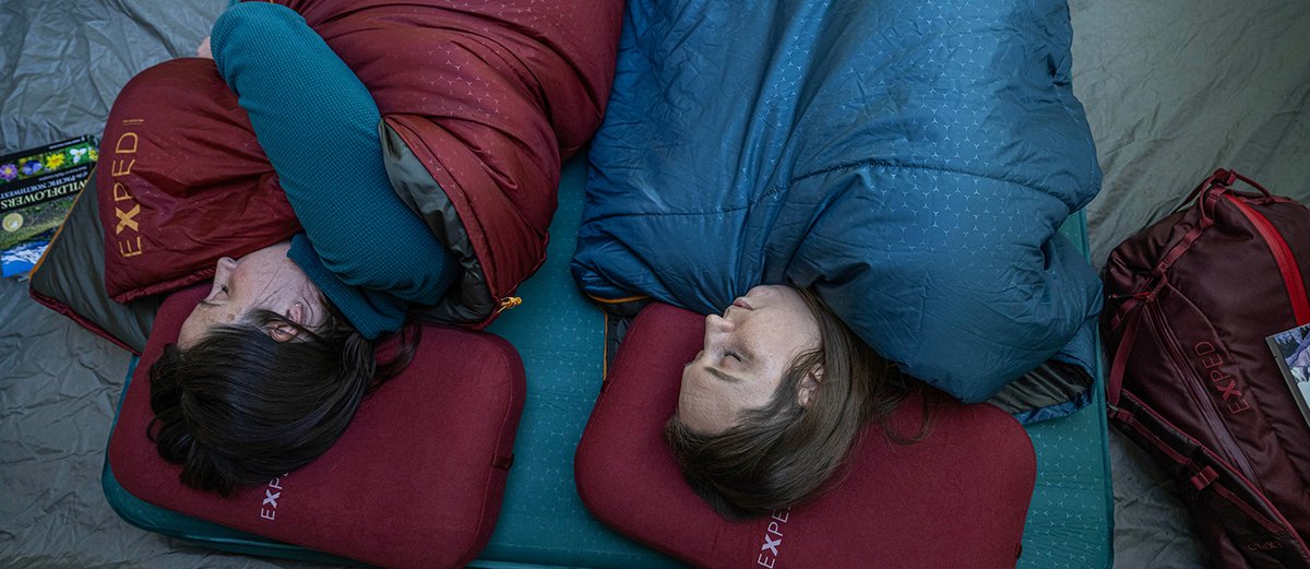 Two women sleeping comfortably side by side on the MegaMat.