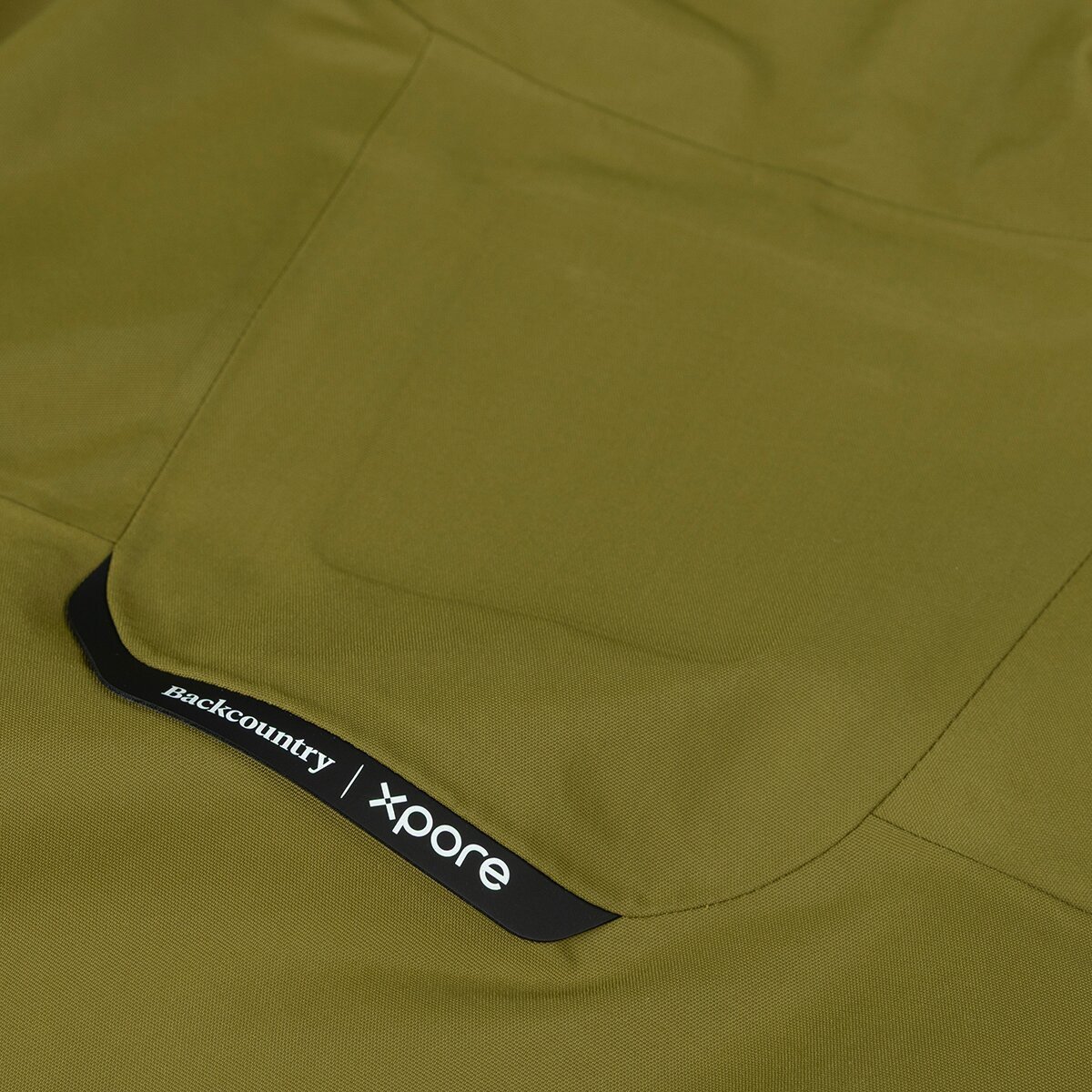 Close up detail shot of Backcountry Xpore branded Cottonwoods ski kit face fabric.