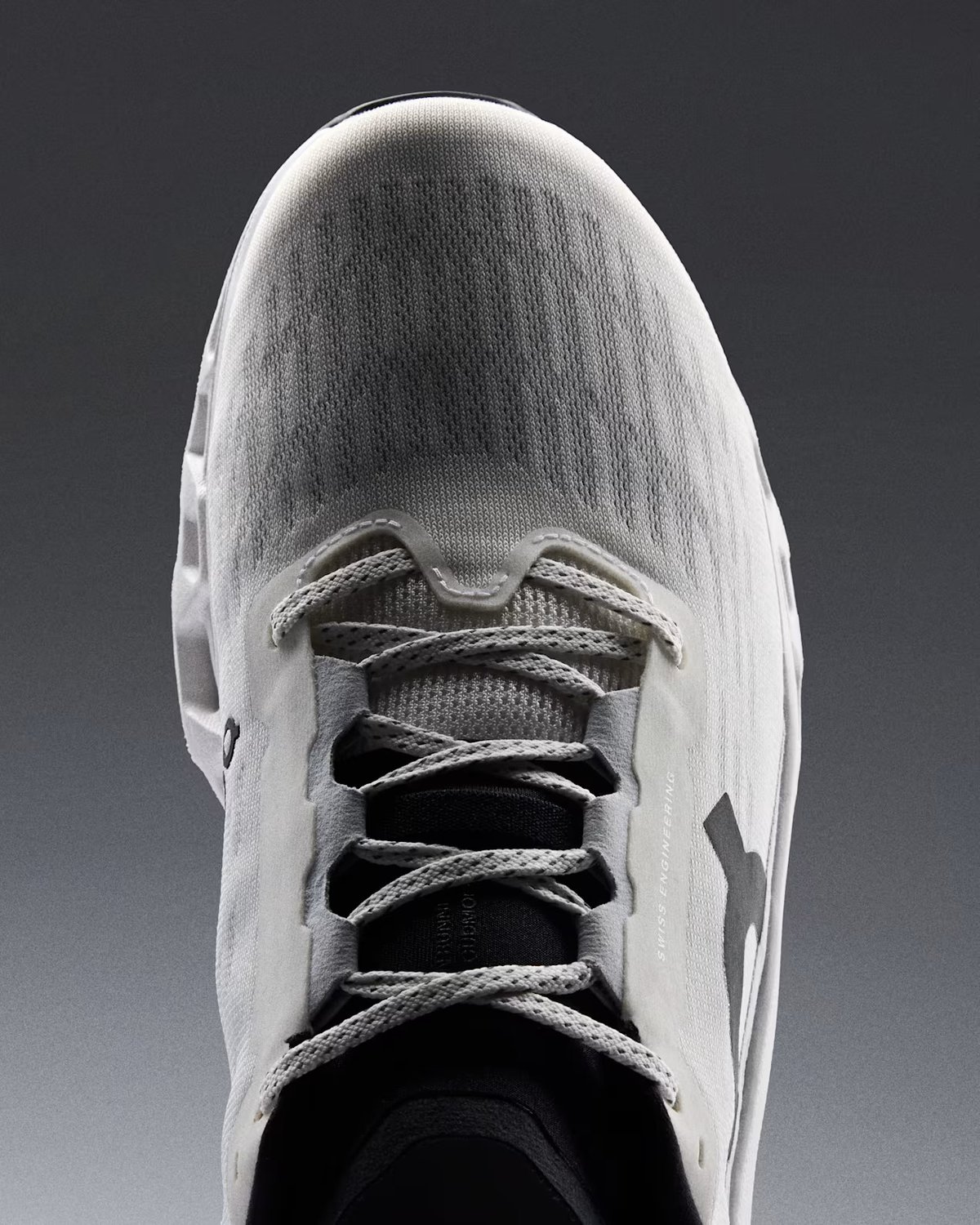 Top down view of Cloudmonster 3 upper lacing and toe box.