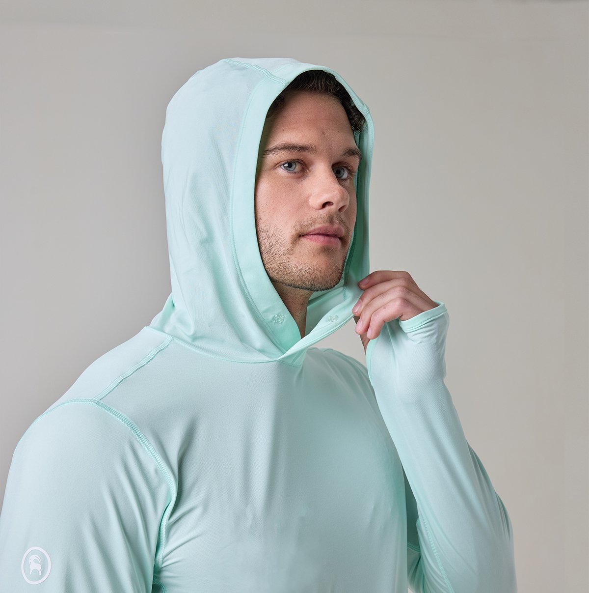 Person wearing Backcountry Tahoe Pro LT sun shirt for full sun coverage with hands and head covered.