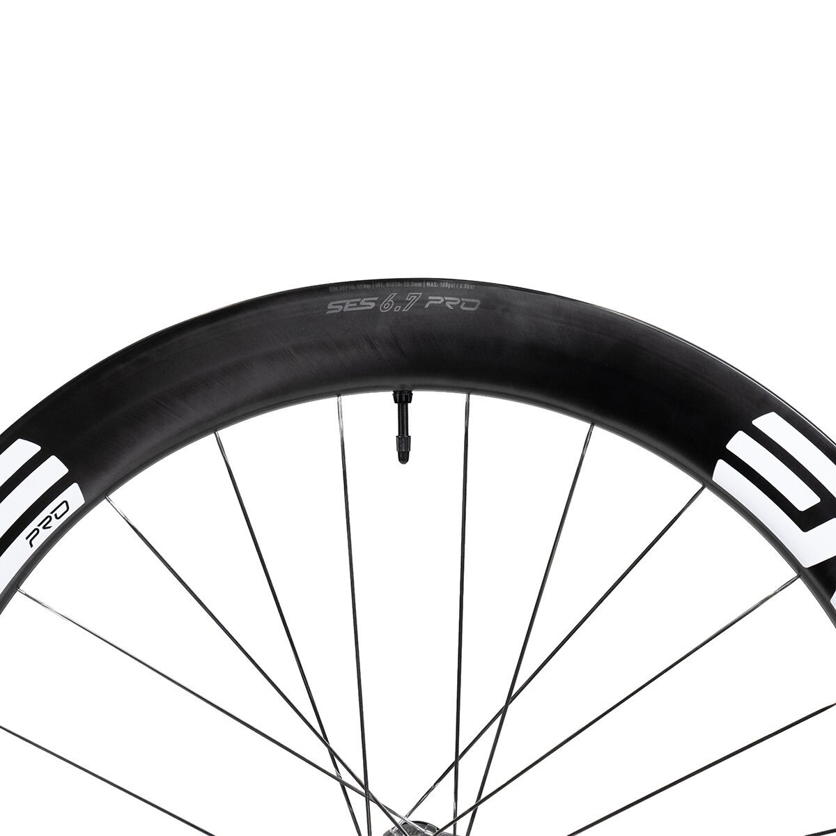 Close-up of ENVE SES 6.7 PRO carbon rim in black and white, showing rim depth and carbon layup detail.
