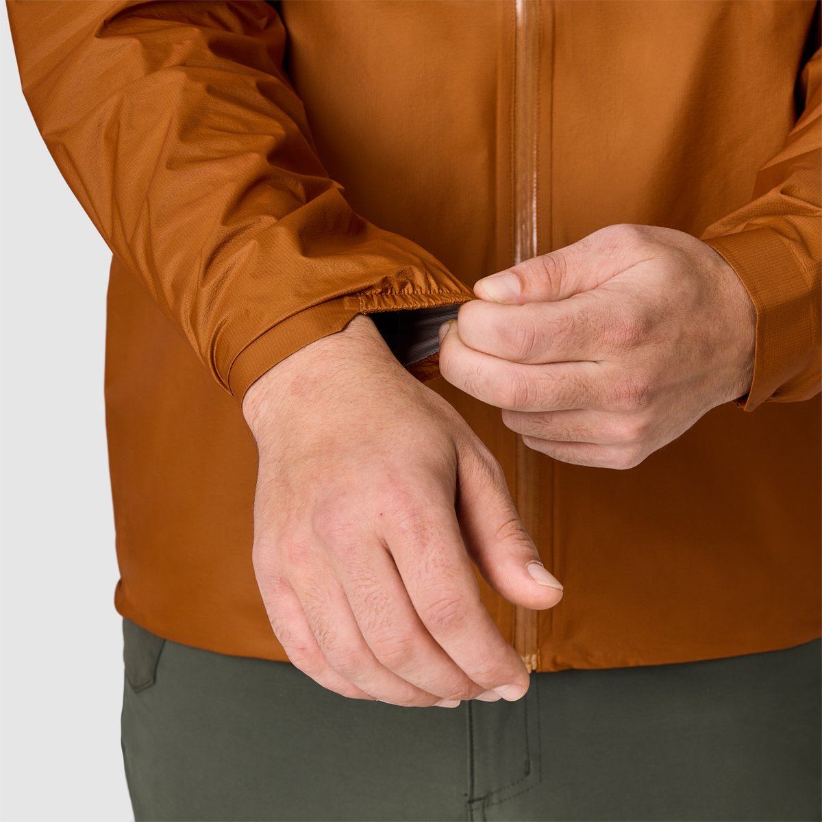 A closeup of the Helium UL sleeves and cuffs being adjusted