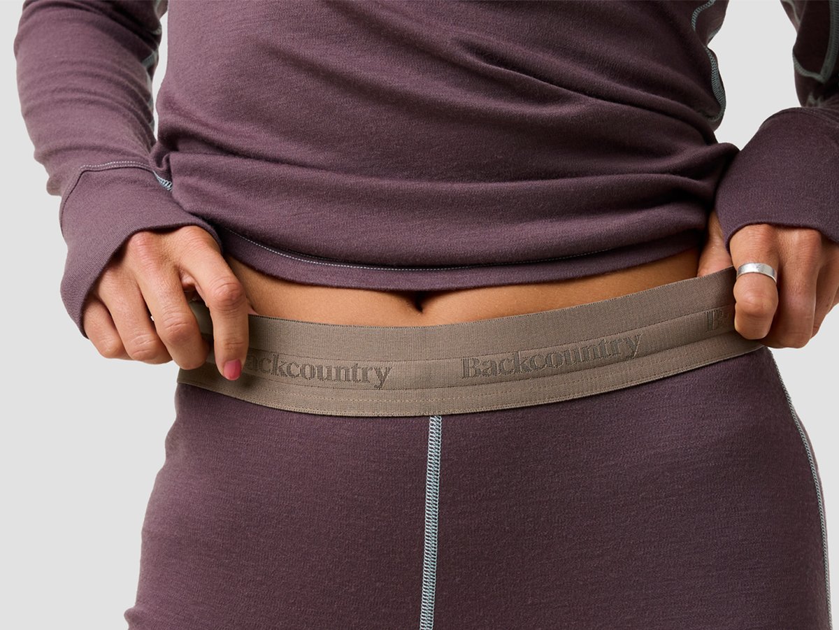 A closeup of the flat infinity drawcord inside the waistband of the Cedars Mid-Weight Bottoms.