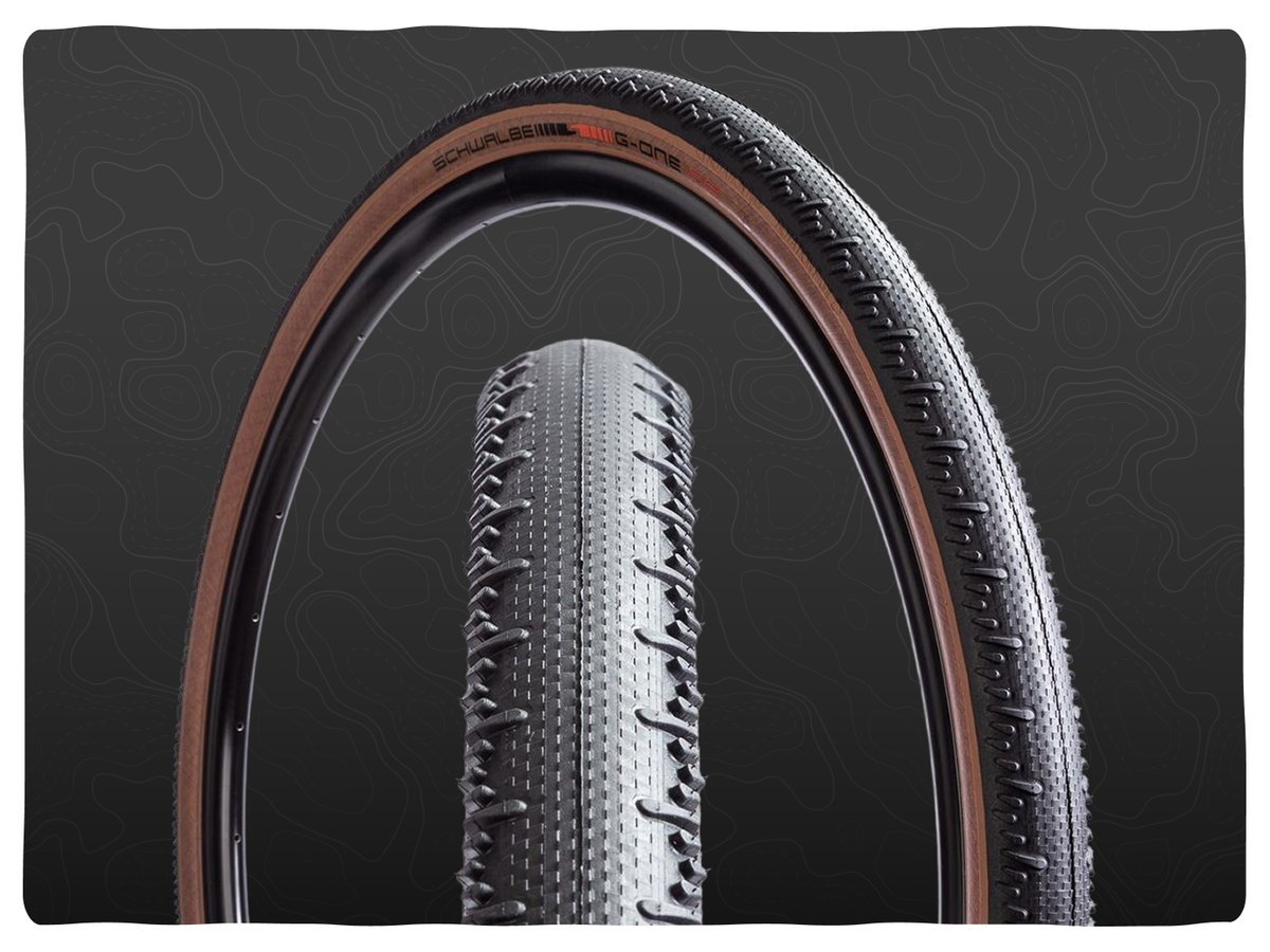 A file tread slick tire with stepped shoulder treads.