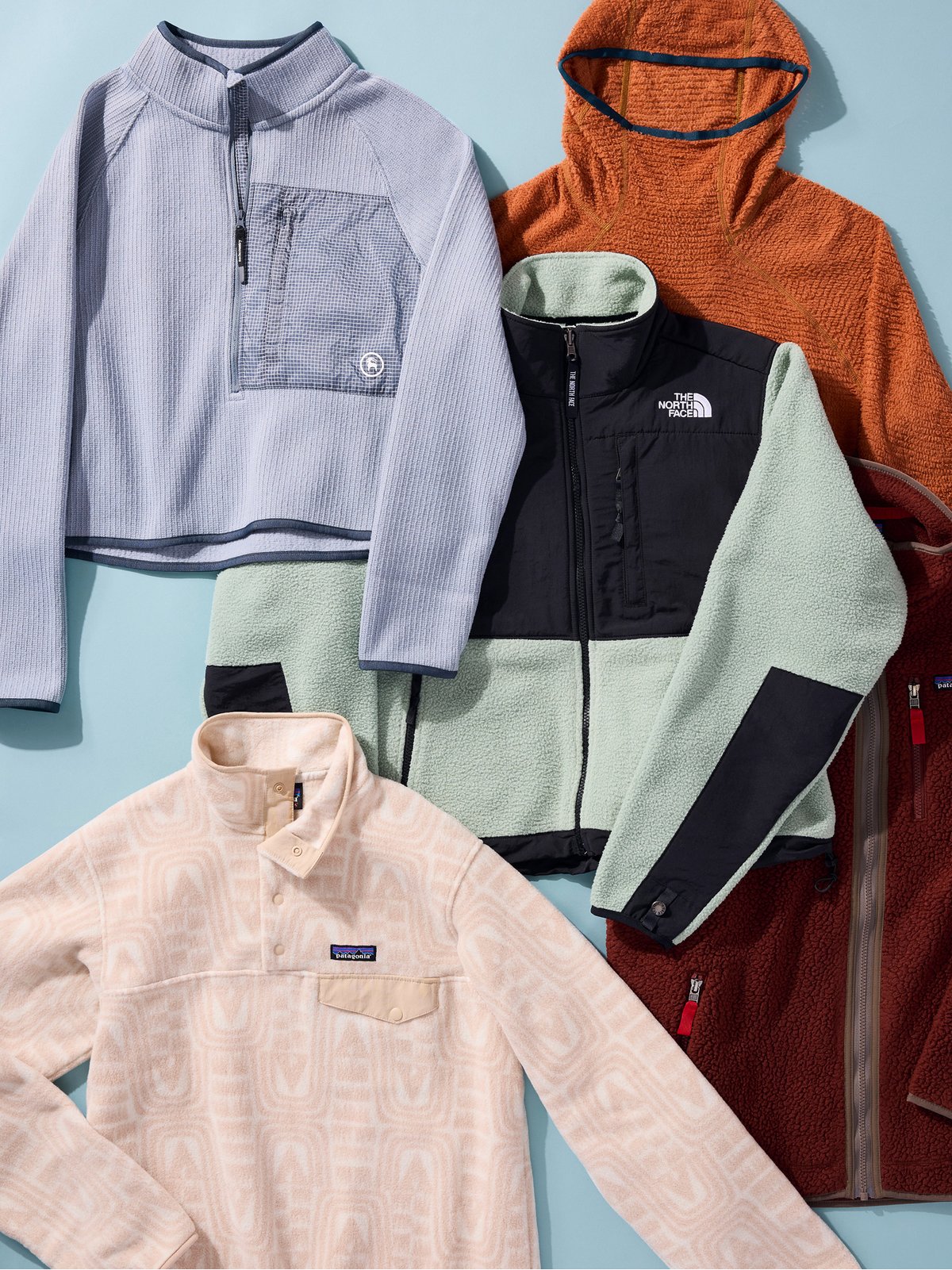 Five fleece pullovers, vests, and jackets.
