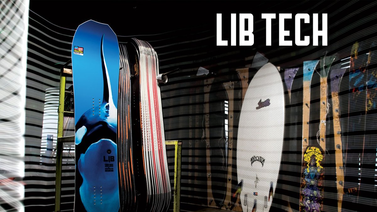 Lib Tech snowboard and wakeboarding boards displayed in a shop featuring blue and white designs with professional water sports equipment.