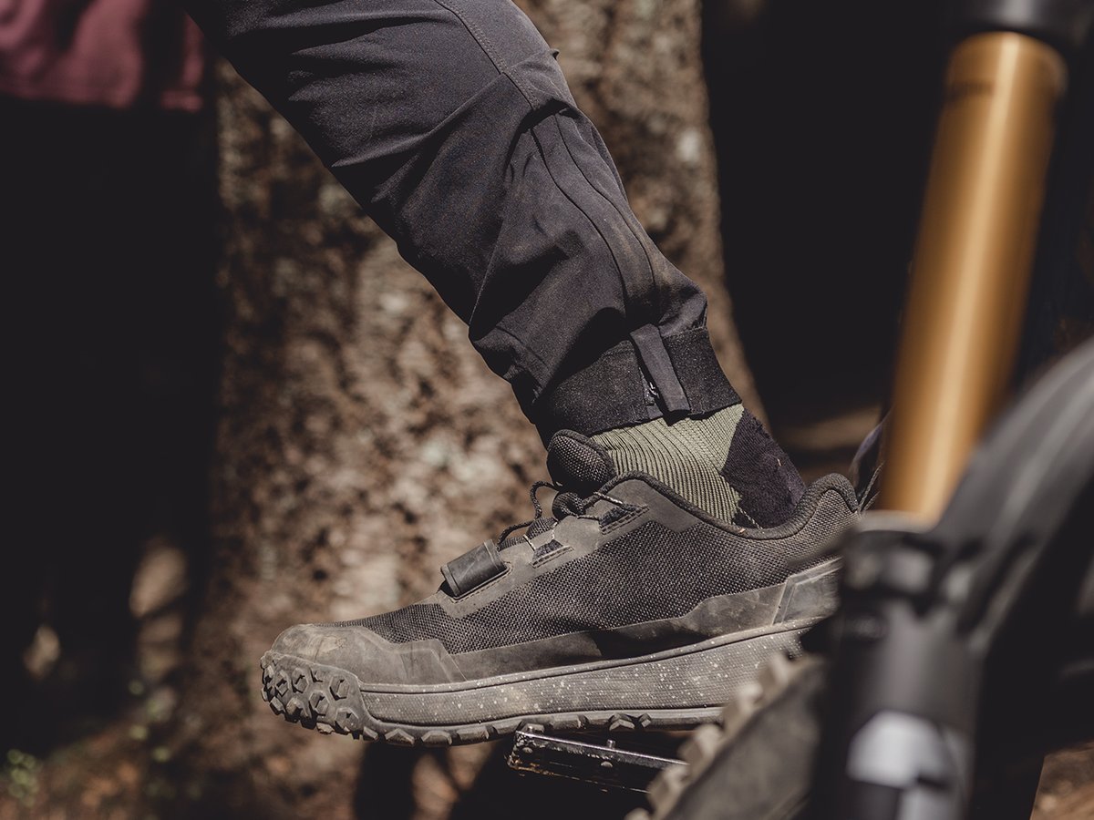 Close up of Slickrock pant tapered ankle with zippered access.