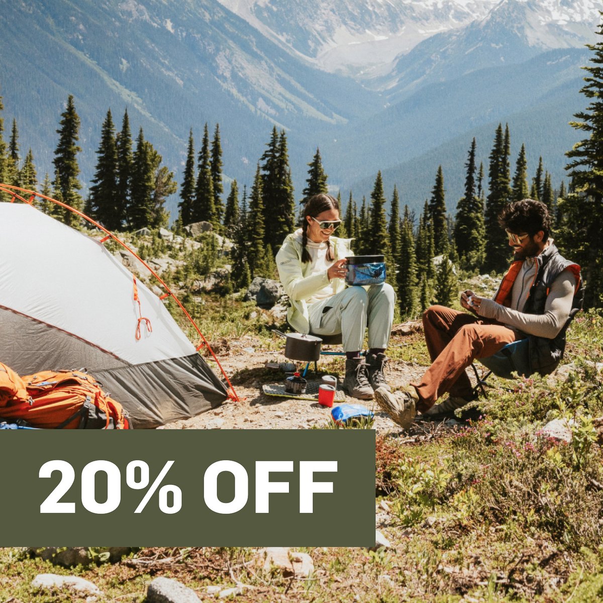 People people sit next to a tent. A promotional flag says 20% off in the top right corner.