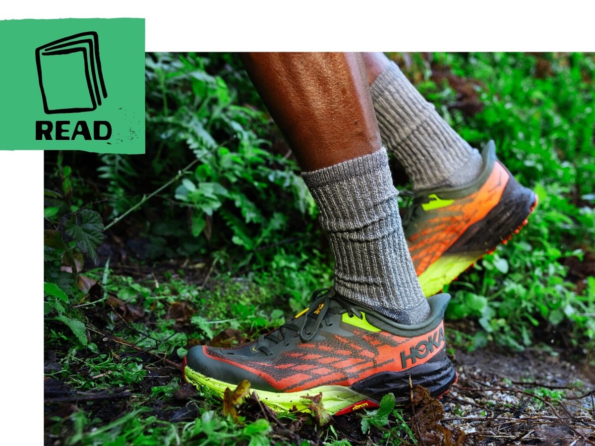 A man hikes on a trail. Text reads:    Best Hiking Shoes For Men     Fit Your Feet In Our Top Picks  